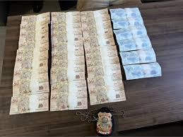 PF prende homem em flagrante com mais de R$ 2 mil em notas falsas recebidas pelos Correios, em Santa Luzia do Oeste